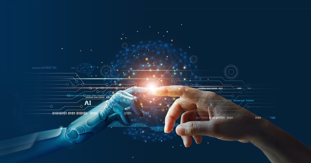 a human hand touching a robot hand, representing AI and humans working together