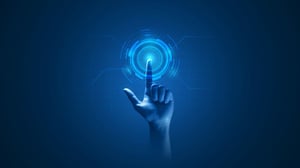 a finger touching a blue shape