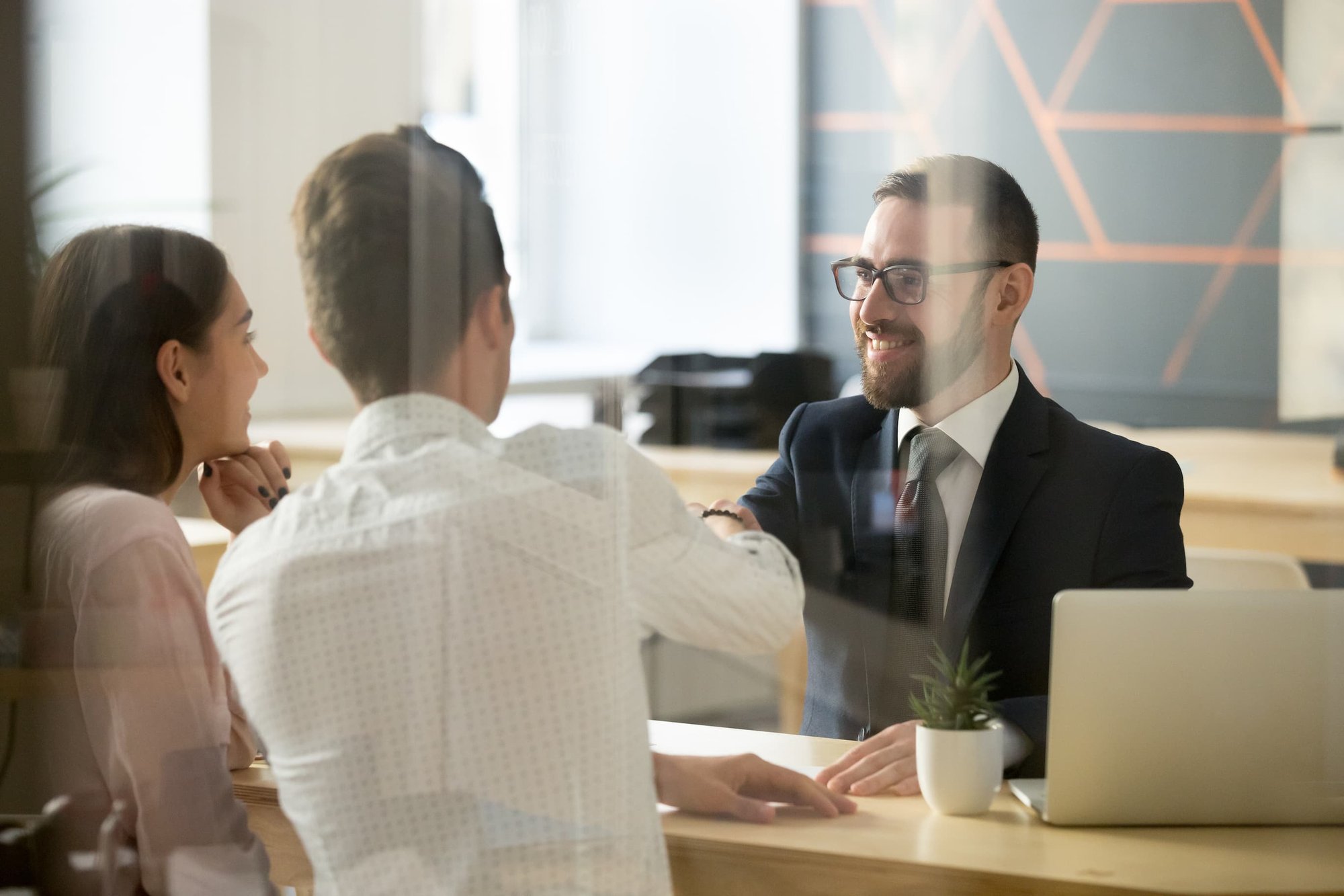a banker serving two customers