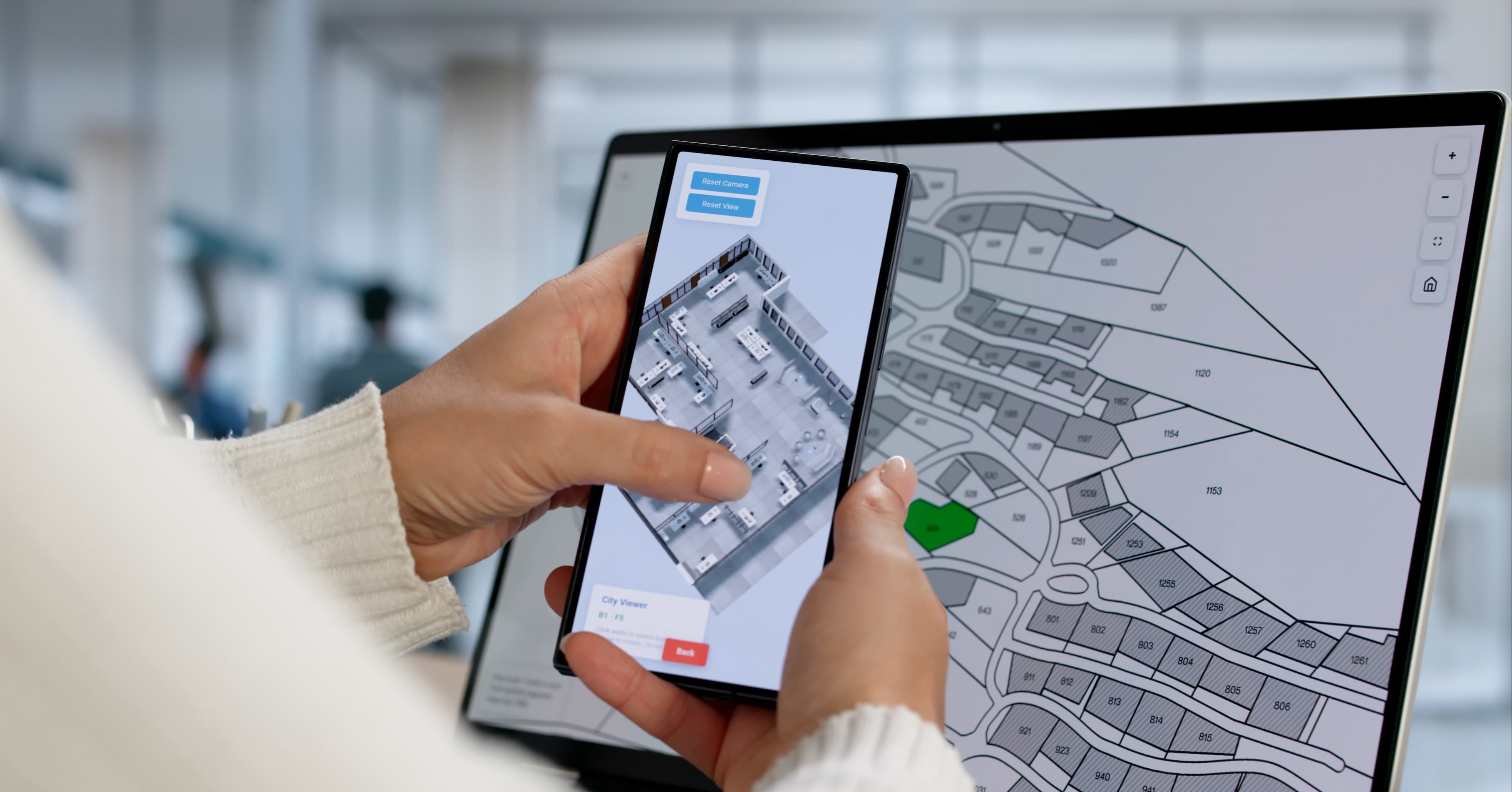 a person accessing GIS software on a phone